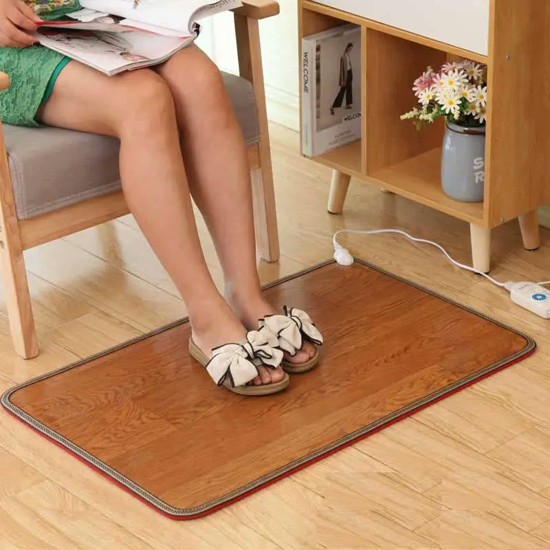 Chauffe-pieds et tapis chauffants Image