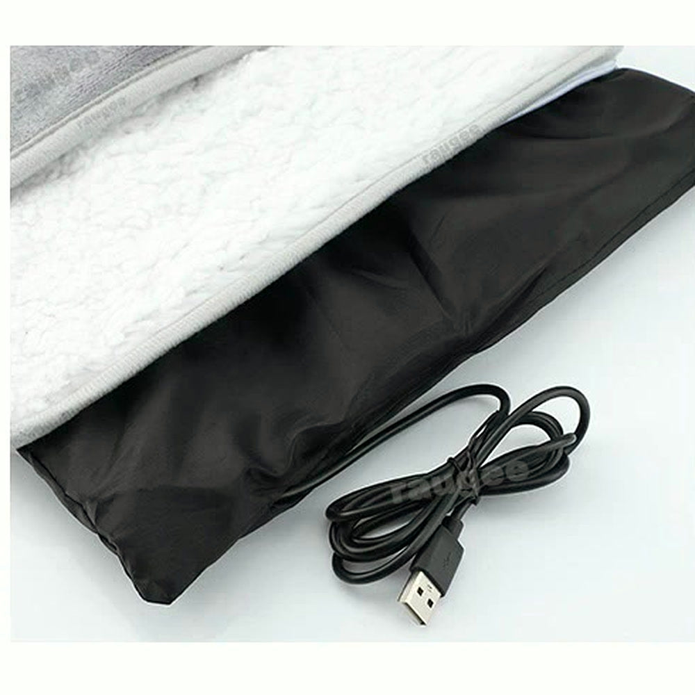 Dessous noir du chauffe-pieds USB et son câble